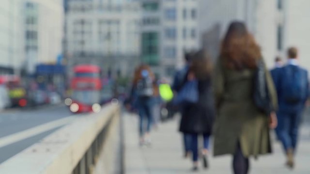 Crowd of pedestrian commuters in London on cool morning in slow motion. Clip 61a
