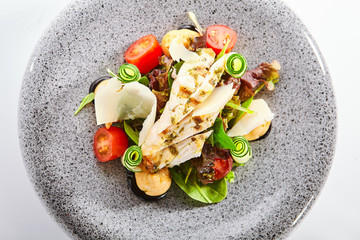 Salad with cheese profiteroles and sous vide chicken