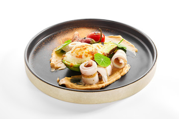 Grilled squid with avocado and egg