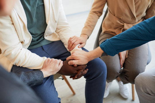 High Angle Closeup Of People Holding Hands While Comforting Each Other In Psychology Support Group, Copy Space