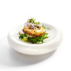 Baked potato with egg and pickled onion