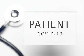 Patient COVID-19 text on plastic ID badge