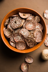 Betel nut chips in a bowl also known as slices of supari in india, used in Paan masala