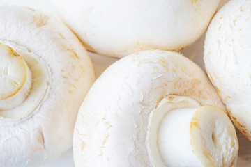 Champignons close-up, detailed closeup. The concept of healthy food, vegetarianism, mushrooms.