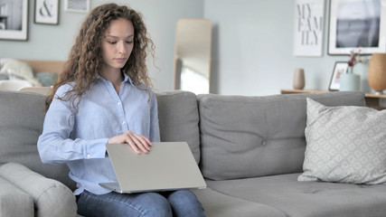 Curly Hair Woman Coming, Sitting and Opening on Laptop