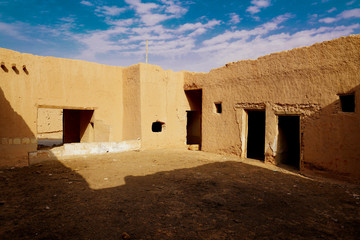 Traditional Old Arabian House abandoned or mud-brick house, the town of "Al Hayir", Saudi Arabia