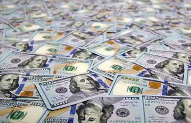 A pile of hundred dollar