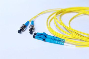 Yellow Fiber Optic cable on white background.