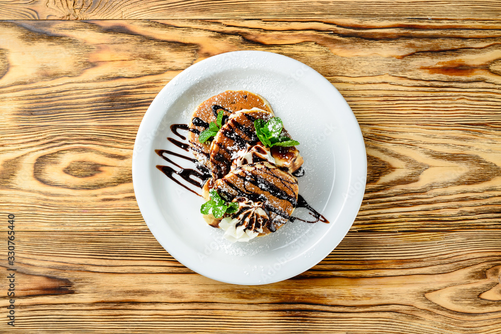 Poster pancake dessert for children with banana and chocolate