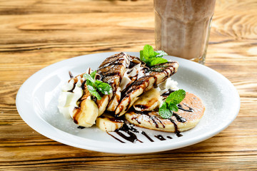 pancake dessert for children with banana and chocolate