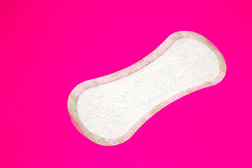Women protection hygiene daily pad on pink background