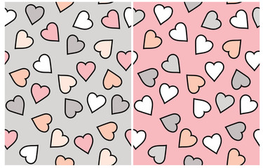 Cute Pastel Color Hearts Seamless Vector Pattern. Romantic Print. Hand Drawn Hearts Isolated on a Pink and Light Gray Background. Repeatable Print with Confetti of Heart Shape with Black Outline.