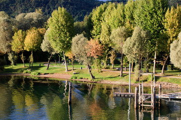 Fototapeta na wymiar Sesto Calende (VA), Italy - September 15, 2016: The Ticino river view from the riverside, Lombardy, Piedmont, Italy.