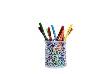 Multicolored markers in a stand on a white background
