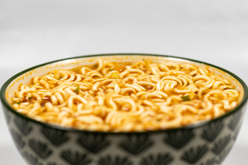 Bowl of noodles, noodle soup in a cup, Asian meal isolated on white backgrounds