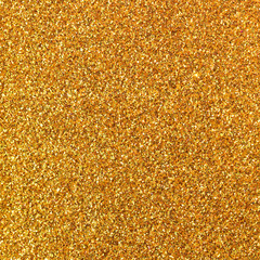 glittery background of golden glitter