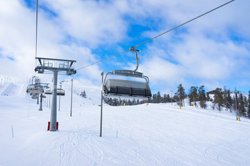 Ski slope with ski lifts on the ski resort