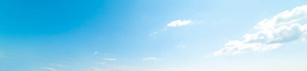 Clear sky with small clouds in the springtime