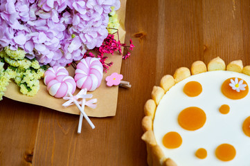 Birthday cake with flowers and number shape candle