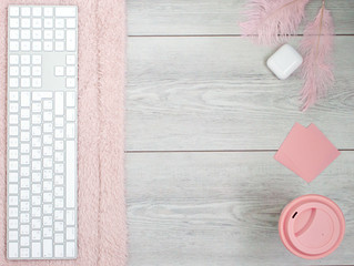 Pink flatlay on white wood background. Flat layout. Beauty and fashion. Top view