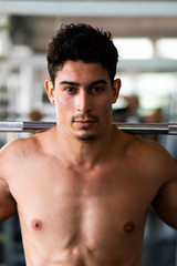 Portrait Of Healthy Athletic Man With Fit Body. Sporty and healthy muscular man. sport, gym, personal trainer and fitness concept
