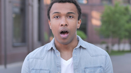 Fototapeta premium Shocked, Outdoor Wondering African Man