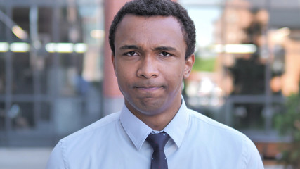 No, African Businessman Shaking Head To Reject