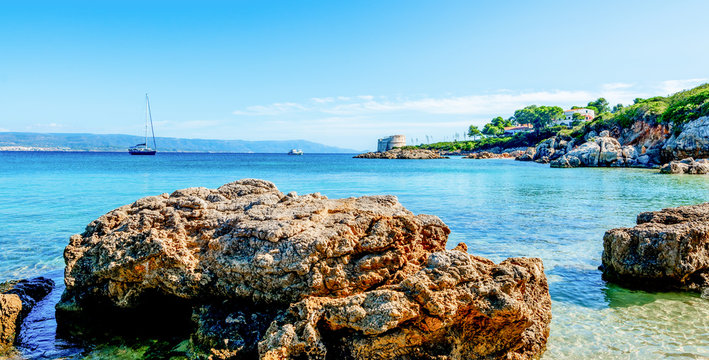 Rocks in a small cove in Alghero