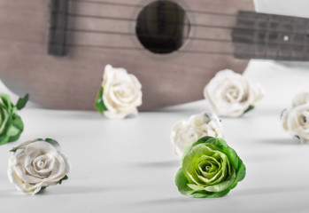 Green and white roses on a white background, vintage style