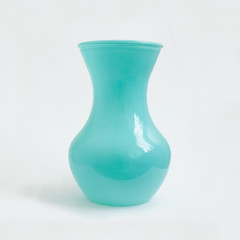Beautiful turquoise vase isolated on white background