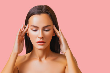 Fototapeta premium young woman with headache 