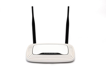 white wi-fi router with black antennas on a white background