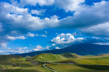 Fototapeta na wymiar Drone view of mountains on a cloudy day in Arvin California