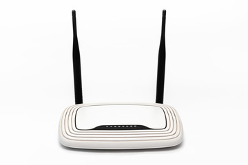 white wi-fi router with black antennas on a white background