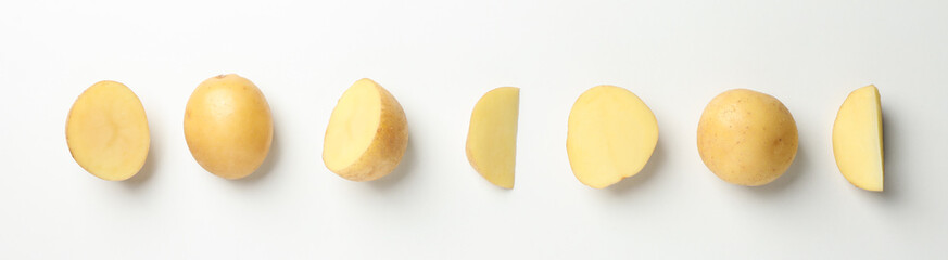 Young potato on white background, top view. Horizontal photo