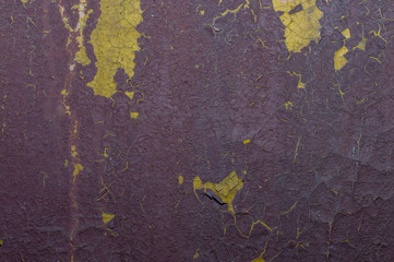 Old painted wall with cracked paint