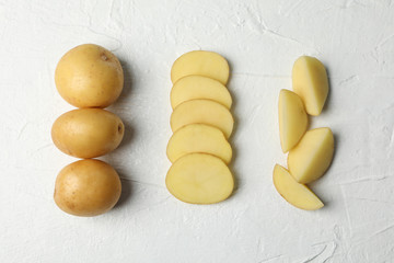 Young potato on white background, top view