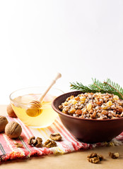 Kutia or kutya is a ceremonial grain dish with sweet gravy traditionally served by Eastern Orthodox Christians