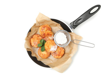 Pan with cheese pancakes isolated on white background