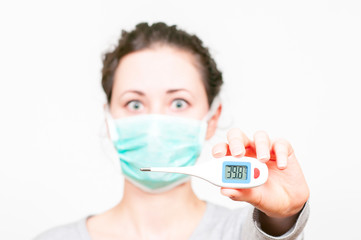 caucasian brunette woman in protective medical mask on face protection for spreading of disease virus SARS-CoV-2, Coronavirus, COVID-19. white background