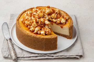 caramel cheesecake with popcorn and salted caramel sauce