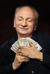old man with dollar bills