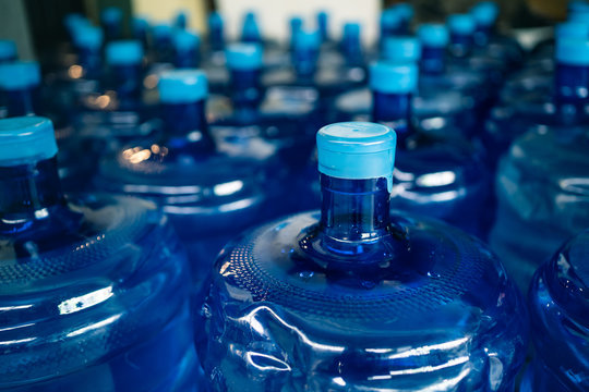 A Pile Of Large Drinking Water Bottles