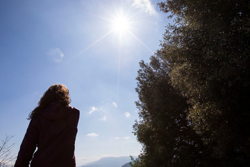 Fototapeta premium Girl freeing herself from the protective mask after overcoming illness, virus, covid-19. coronavirus