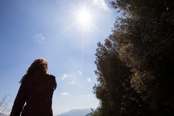 Girl freeing herself from the protective mask after overcoming illness, virus, covid-19. coronavirus