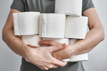 People are stocking up toilet paper for home quarantine from coronavirus - obrazy, fototapety, plakaty
