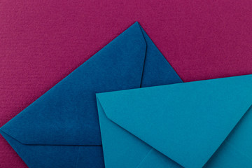 Colorful envelopes on a purple background.