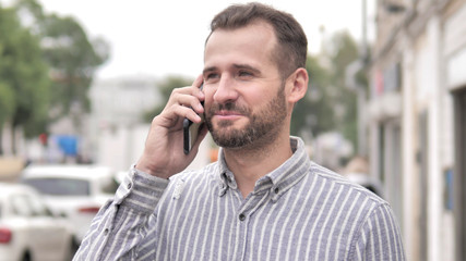 Outdoor Beard Casual Man Talking on Phone