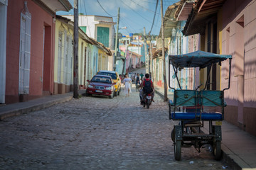 Obraz na płótnie Canvas rickshaw in a street of Trinidad de Cuba