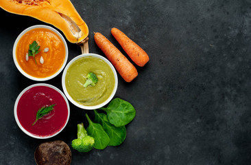 Set of vegetable soups. Broccoli, spinach, green peas soup. Pumpkin and carrot soup. Beetroot and...